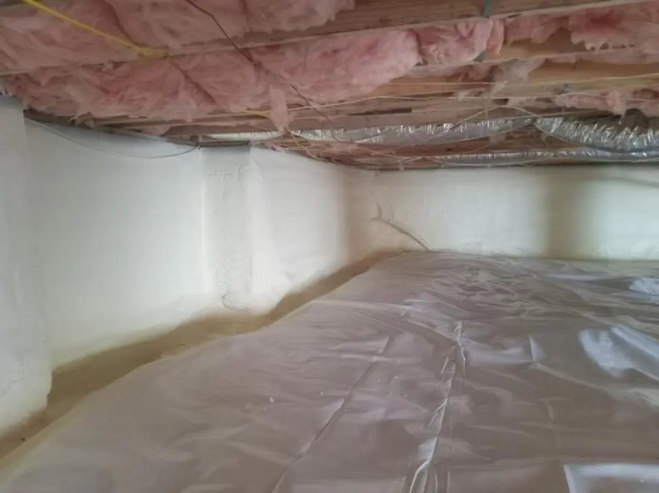 Crawl space encapsulation with closed-cell spray foam for Commercial Roof Restoration in Saratoga Springs